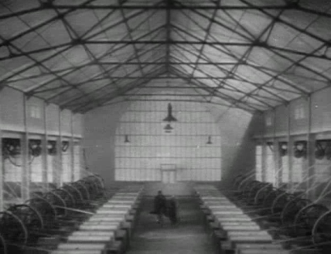 Escape through Swiss chocolate factory in Alfred Hitchcock's Secret Agent (1936)