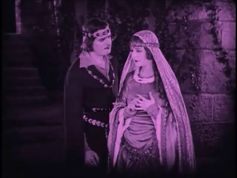Douglas Fairbanks as Earl of Huntingdon and Enid Bennett as Lady Marian in Robin Hood (1922)