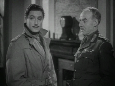 Robert Donat and Frederic Richter in The Adventures of Tartu (1943)